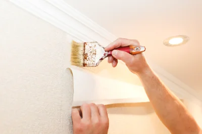 Pose de papier peint à Dambron — revêtements muraux et toiles de verre
